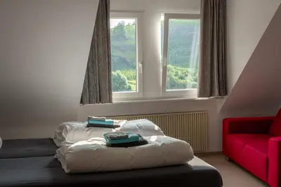 Ein Bett oder Betten in einem Zimmer der Unterkunft Ferienhaus am Kloster Stuben