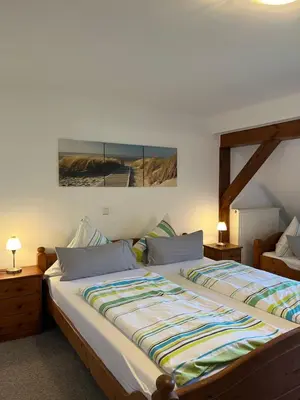 Ein Bett oder Betten in einem Zimmer der Unterkunft Waldhaus Lahnstein