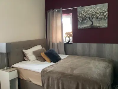 Ein Bett oder Betten in einem Zimmer der Unterkunft Ambiente Wohnen im Garten