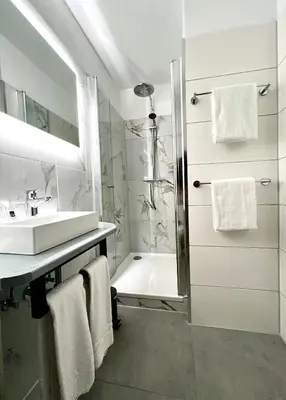 Ein Badezimmer in der Unterkunft Hotel St. Georg
