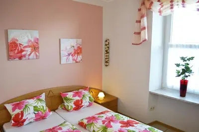 Ein Bett oder Betten in einem Zimmer der Unterkunft Weingut Mathy-Schanz