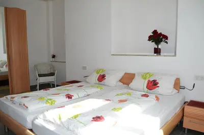 Ein Bett oder Betten in einem Zimmer der Unterkunft Weingut Mathy-Schanz