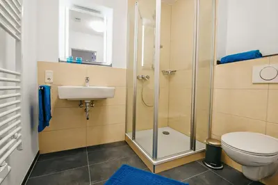 Ein Badezimmer in der Unterkunft Kronser Ferienwohnungen