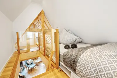 Ein Bett oder Betten in einem Zimmer der Unterkunft Kronser Ferienwohnungen