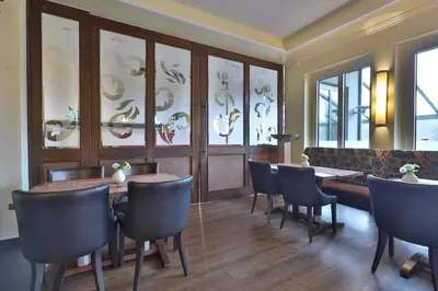 Ein Sitzbereich in der Unterkunft M13 Hotel