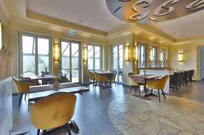Ein Sitzbereich in der Unterkunft M13 Hotel