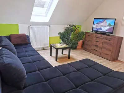 TV/Unterhaltungsangebot in der Unterkunft Pitlane Apartments am Brünnchen