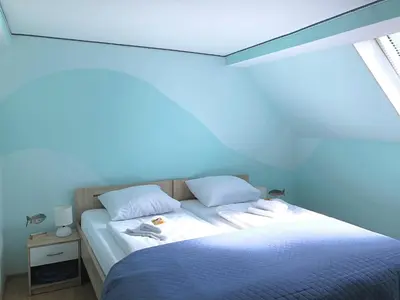Ein Bett oder Betten in einem Zimmer der Unterkunft MaximilianHaus