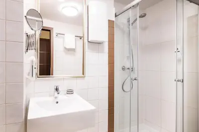 Ein Badezimmer in der Unterkunft Schroeders City-Style-Hotel