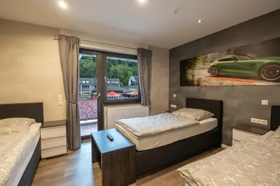 Ein Bett oder Betten in einem Zimmer der Unterkunft Guesthouse Cockpit