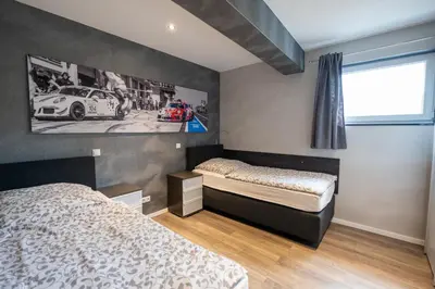 Ein Bett oder Betten in einem Zimmer der Unterkunft Guesthouse Cockpit
