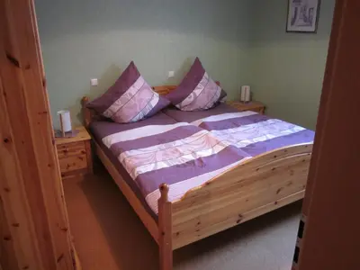 Ein Bett oder Betten in einem Zimmer der Unterkunft Gästehaus Jüngling