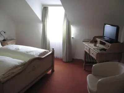 Ein Bett oder Betten in einem Zimmer der Unterkunft Hotel-Restaurant 