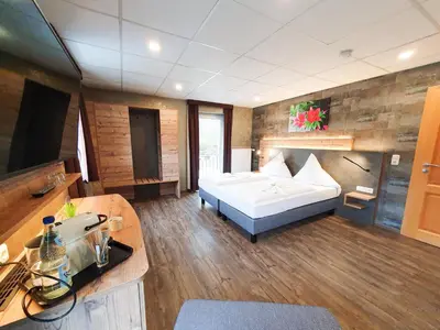 Ein Bett oder Betten in einem Zimmer der Unterkunft Winzerhaus Gärtner - An der Loreley