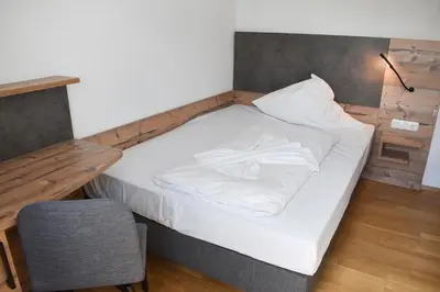 Ein Bett oder Betten in einem Zimmer der Unterkunft Winzerhaus Gärtner - An der Loreley