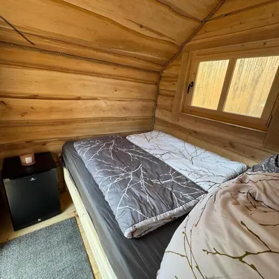 Ein Bett oder Betten in einem Zimmer der Unterkunft Winzerhaus Gärtner - An der Loreley