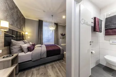 Ein Badezimmer in der Unterkunft Apartmenthaus Burgenheimat in Rhens bei Koblenz