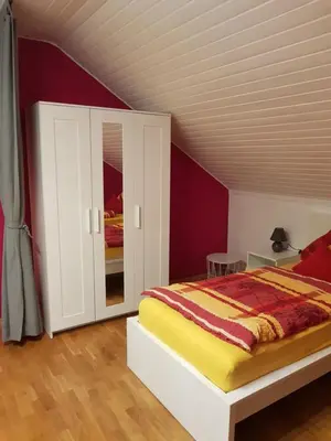 Ein Bett oder Betten in einem Zimmer der Unterkunft Ferienwohnung Hedi