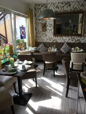 Ein Sitzbereich in der Unterkunft Gaestehaus Klaus