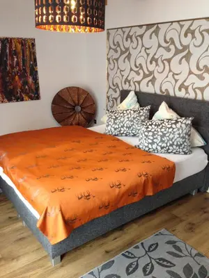 Ein Bett oder Betten in einem Zimmer der Unterkunft Gaestehaus Klaus