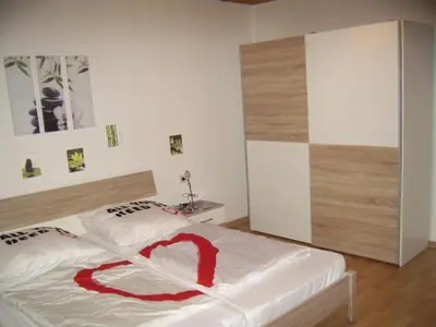 Ein Bett oder Betten in einem Zimmer der Unterkunft Ferienwohnung Bergblick