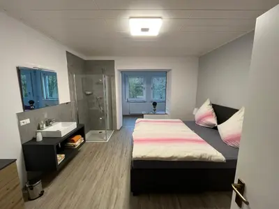 Ein Bett oder Betten in einem Zimmer der Unterkunft Haus Osterlämmchen