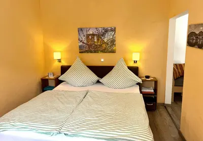 Ein Bett oder Betten in einem Zimmer der Unterkunft Haus Osterlämmchen