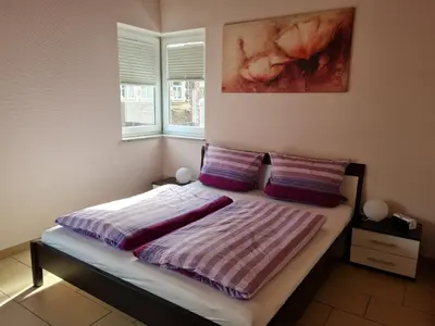 Ein Bett oder Betten in einem Zimmer der Unterkunft Weingut Markus Busch