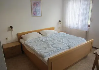 Ein Bett oder Betten in einem Zimmer der Unterkunft Ferienhaus Vulkaneifel Kopp