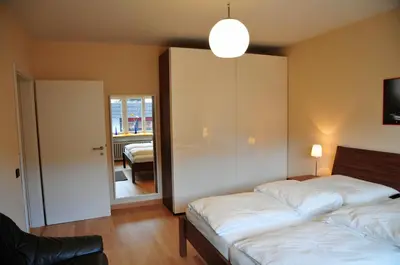 Ein Bett oder Betten in einem Zimmer der Unterkunft Ferienwohnung Noviomagus