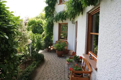 Ein Garten an der Unterkunft Ferienwohnung Mosella
