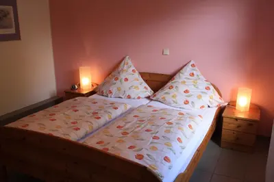 Ein Bett oder Betten in einem Zimmer der Unterkunft Ferienwohnung Mosella