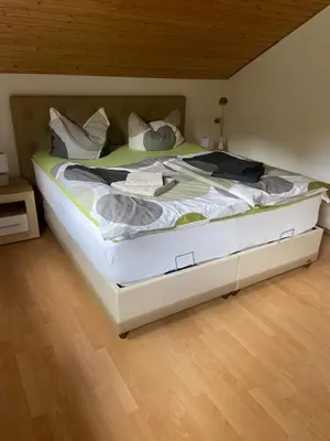 Ein Bett oder Betten in einem Zimmer der Unterkunft Ferienhaus Mausberg