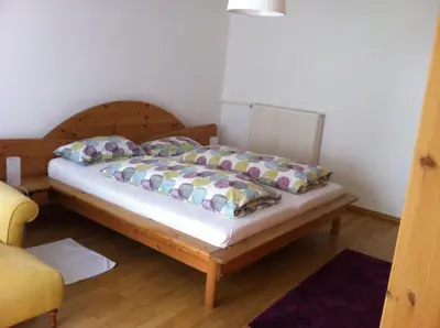 Ein Bett oder Betten in einem Zimmer der Unterkunft 'Ferienhaus Mosel' mit kostenfreien ÖPNV-Ticket