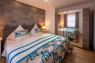 Ein Bett oder Betten in einem Zimmer der Unterkunft Maarberg Resort