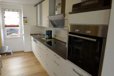 Küche/Küchenzeile in der Unterkunft Ferienhaus Moselblick mit kostenfreien ÖPNV-Ticket