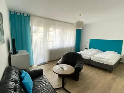 Ein Bett oder Betten in einem Zimmer der Unterkunft Hotel Rebstock
