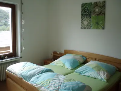 Ein Bett oder Betten in einem Zimmer der Unterkunft Weingut Theodor Nies