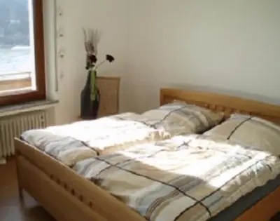 Ein Bett oder Betten in einem Zimmer der Unterkunft Weingut Theodor Nies