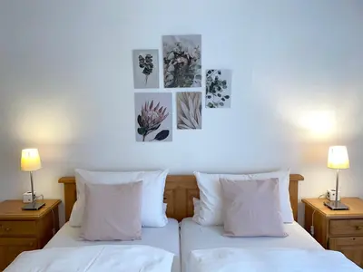 Ein Bett oder Betten in einem Zimmer der Unterkunft Hotel-Pension Hommen