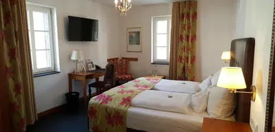 Ein Bett oder Betten in einem Zimmer der Unterkunft Villa Beilstein