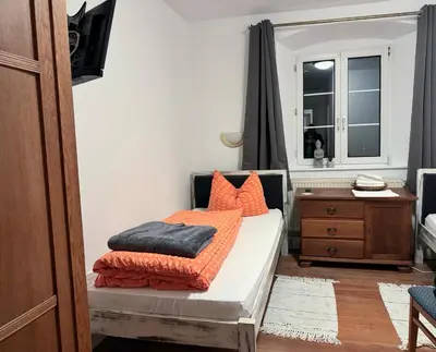 Ein Bett oder Betten in einem Zimmer der Unterkunft Vogtshof von Wetteldorf