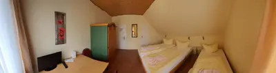 Ein Bett oder Betten in einem Zimmer der Unterkunft Hotel & Restaurant Beckmanns Winzerhaus