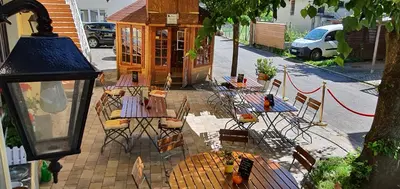 Ein Restaurant oder anderes Speiselokal in der Unterkunft Hotel & Restaurant Beckmanns Winzerhaus