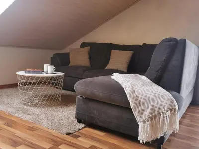 Ein Sitzbereich in der Unterkunft Apartment Hasselstrasse