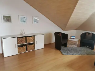 Ein Sitzbereich in der Unterkunft Apartment Hasselstrasse
