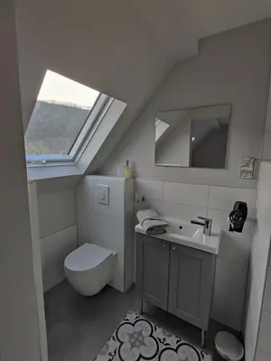 Ein Badezimmer in der Unterkunft Gästehaus Voyage