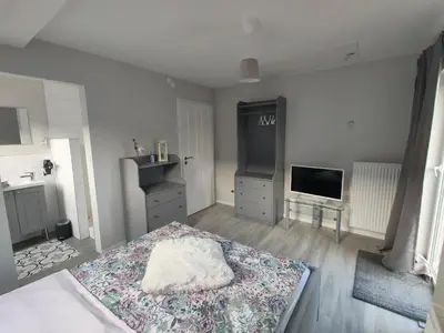 Ein Bett oder Betten in einem Zimmer der Unterkunft Gästehaus Voyage