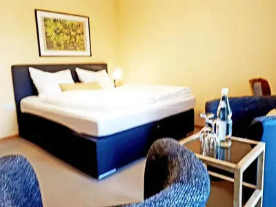 Ein Bett oder Betten in einem Zimmer der Unterkunft Hotel Restaurant Denis