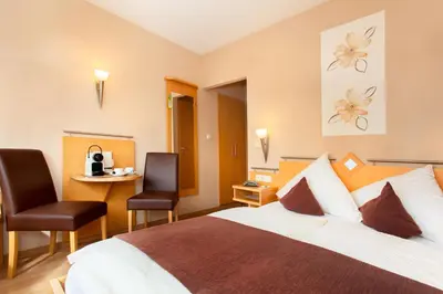 Ein Bett oder Betten in einem Zimmer der Unterkunft Moselhaus Weiskopf `SelfCheckIn`OffSiteBreakfast`CityParking`